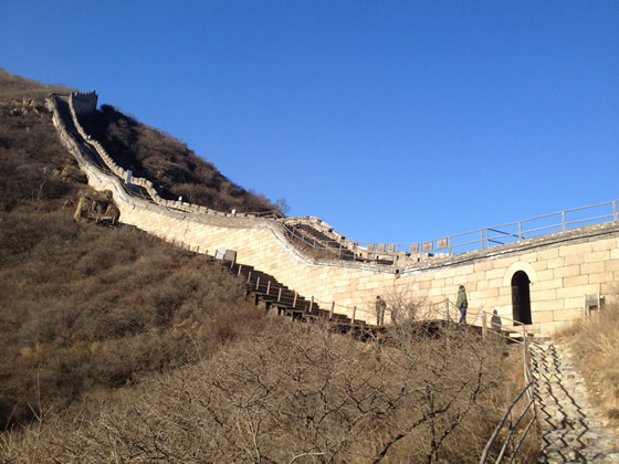 The lower parts of the wall are protected with iron railings and wood walking boards 