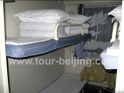 We take hard sleeper, six persons in one room without door